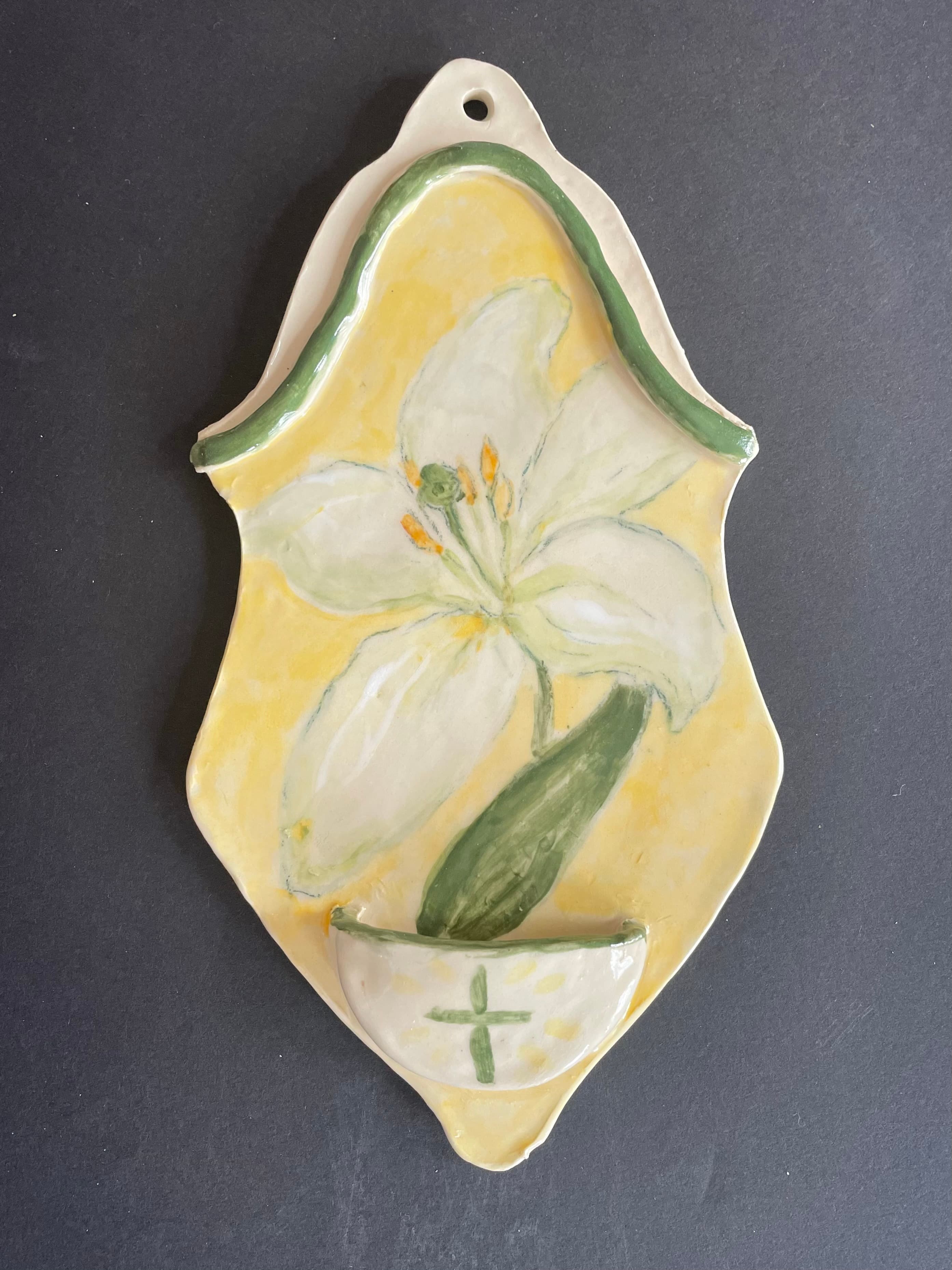 Holy water font with lily